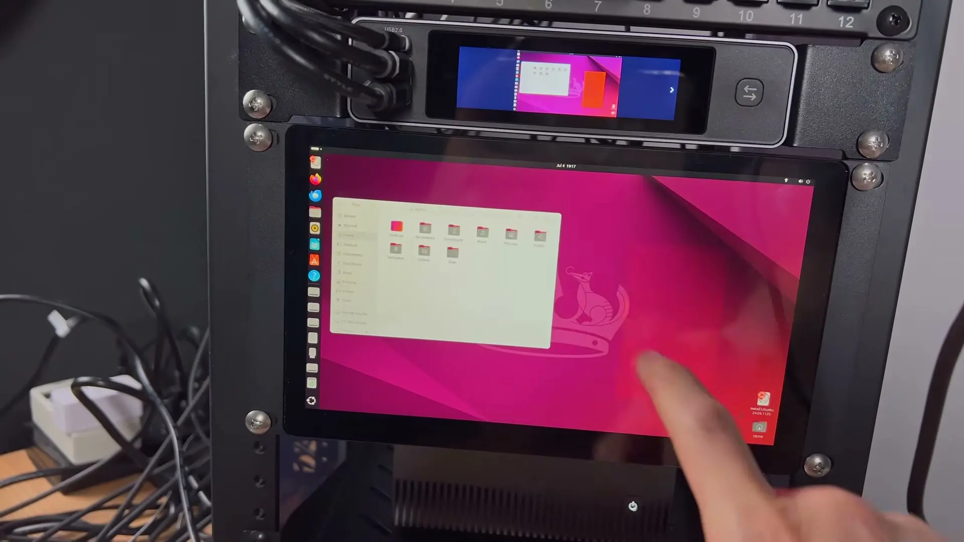 Comet X touchscreen above a 9-inch rackmount display showing an Ubuntu desktop