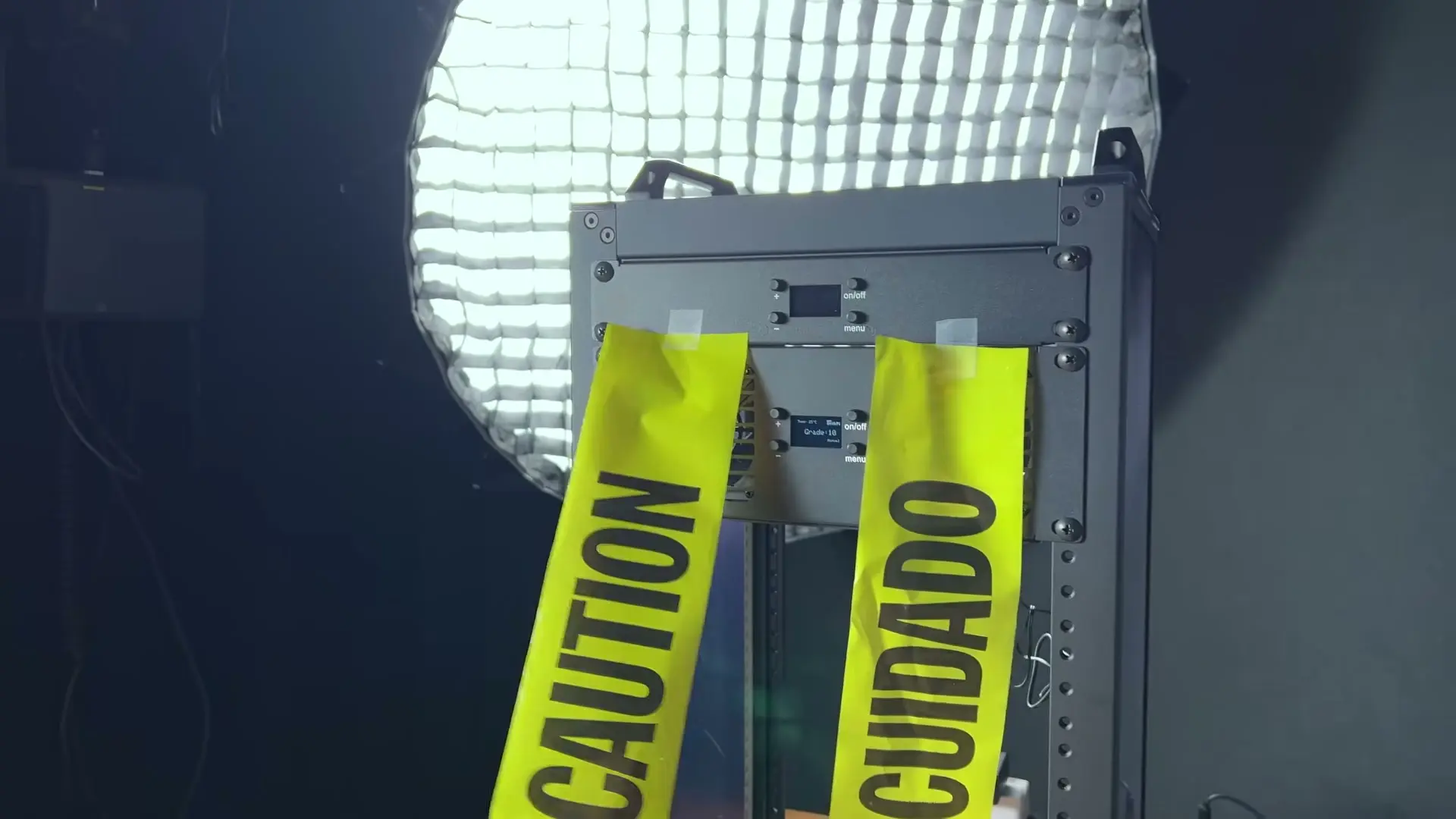 Caution tape hanging in front of installed cooling panels during an airflow test