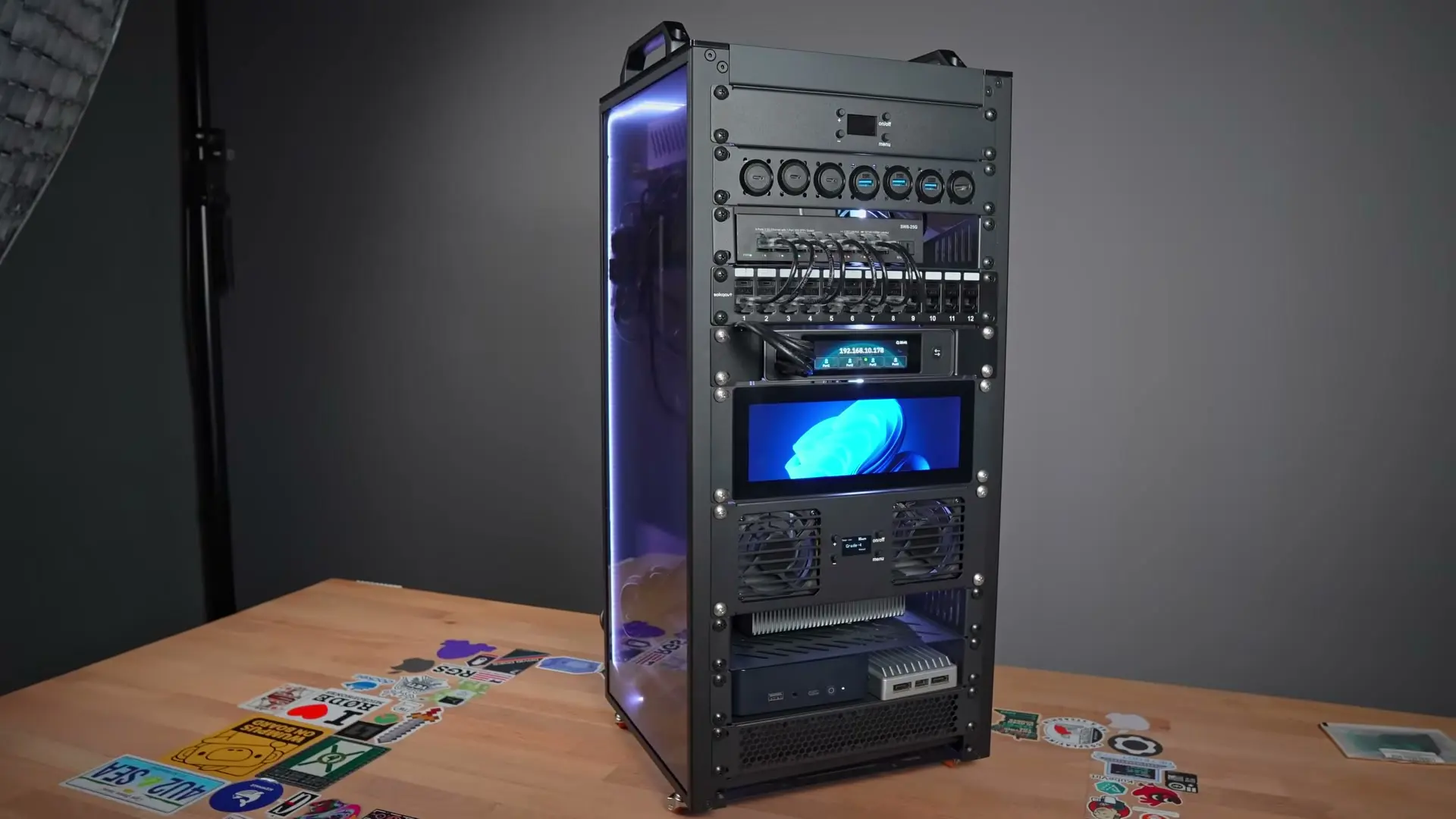Finished 12U DeskPi RackMate T2 with patch panel, touchscreens, cooling panel, and mini PCs