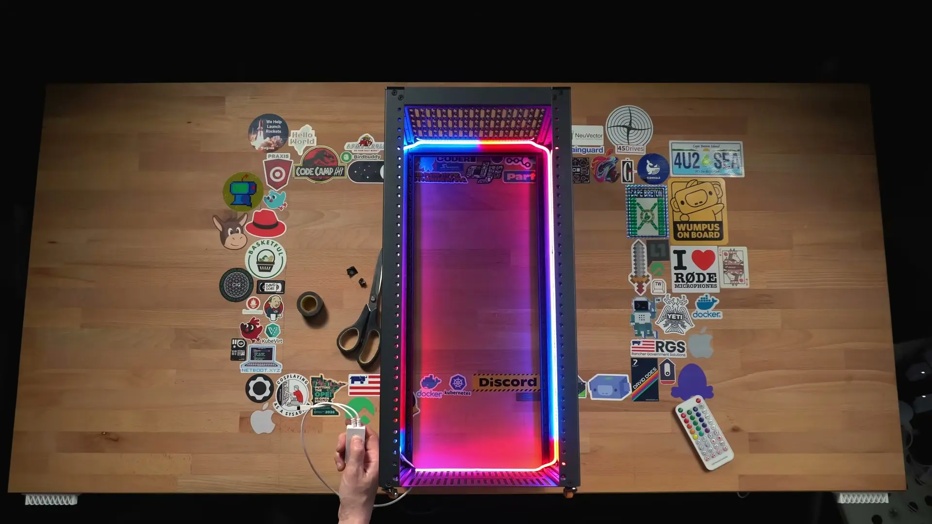 Pink and blue RGB COB light strip installed around the inside of an empty RackMate frame