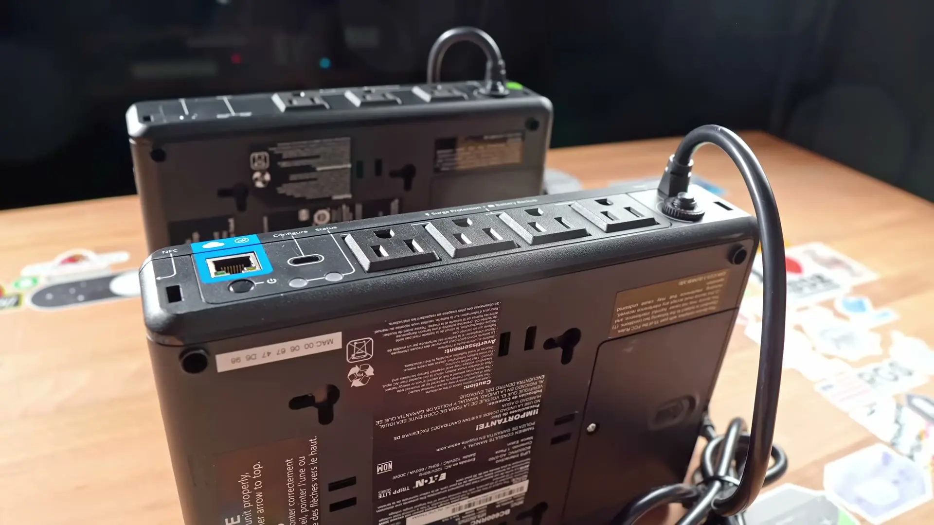 Cloud-connected Eaton Tripp Lite UPS in front of the standard compact model